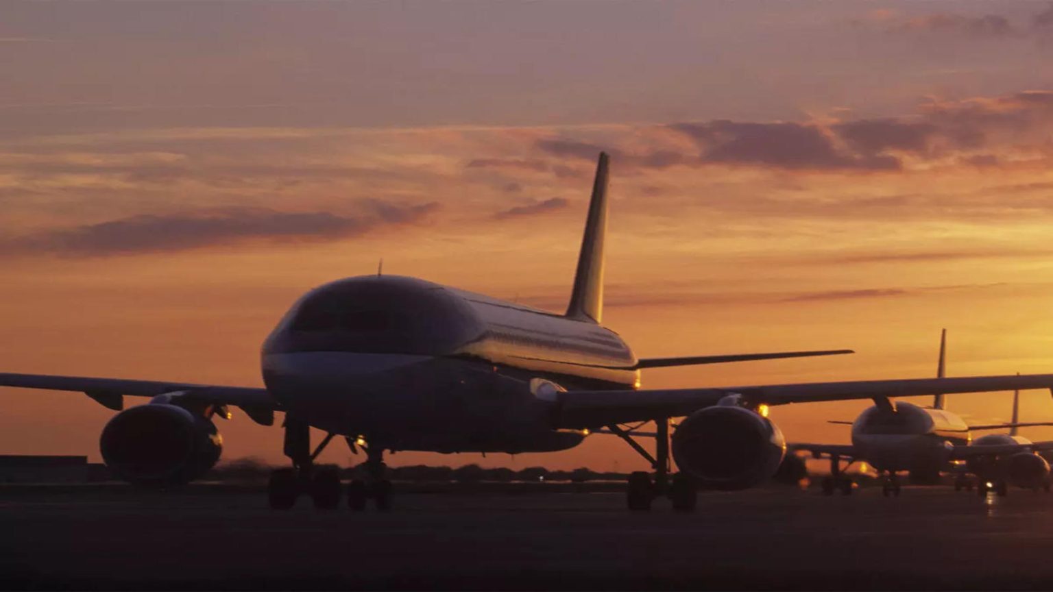 An aircraft with three passengers on board lands at an Australian airport without its landing gear after burning off fuel