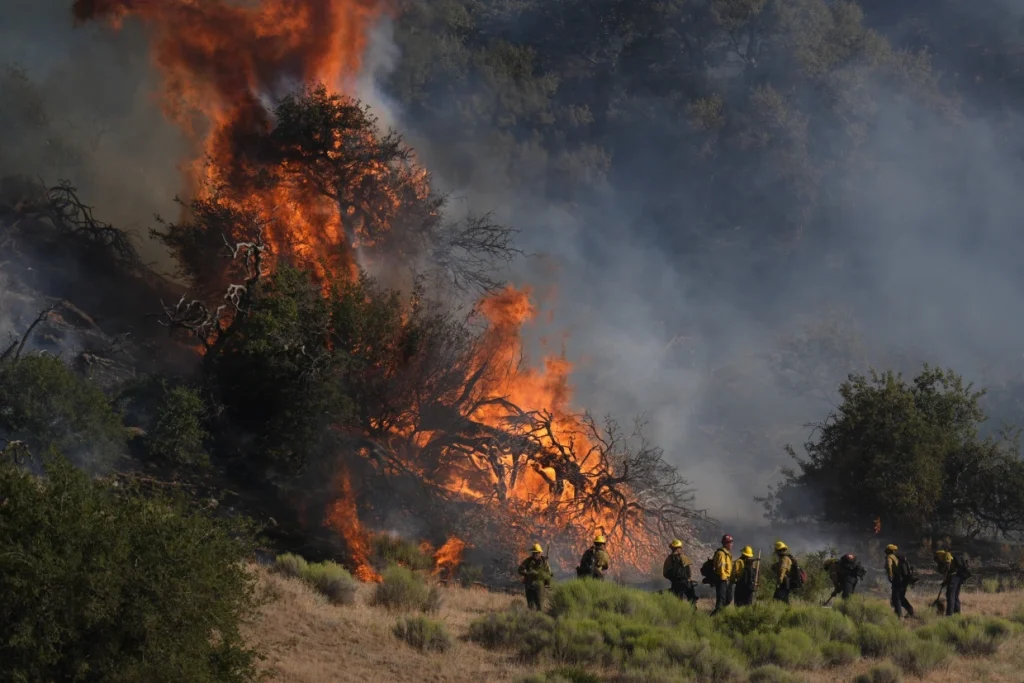 As evacuation orders are issued, wildfire north of Los Angeles continues to spread