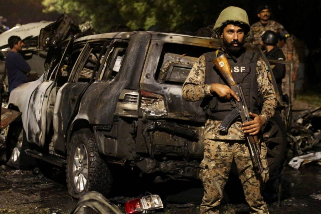 Gunmen attack Pakistan passenger vehicles, killing at least 38 people