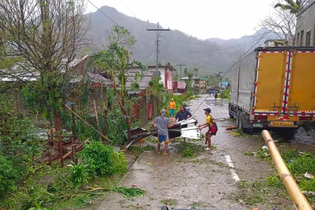 Latest typhoon lashes the Philippines, causing tidal surges and displacing thousands